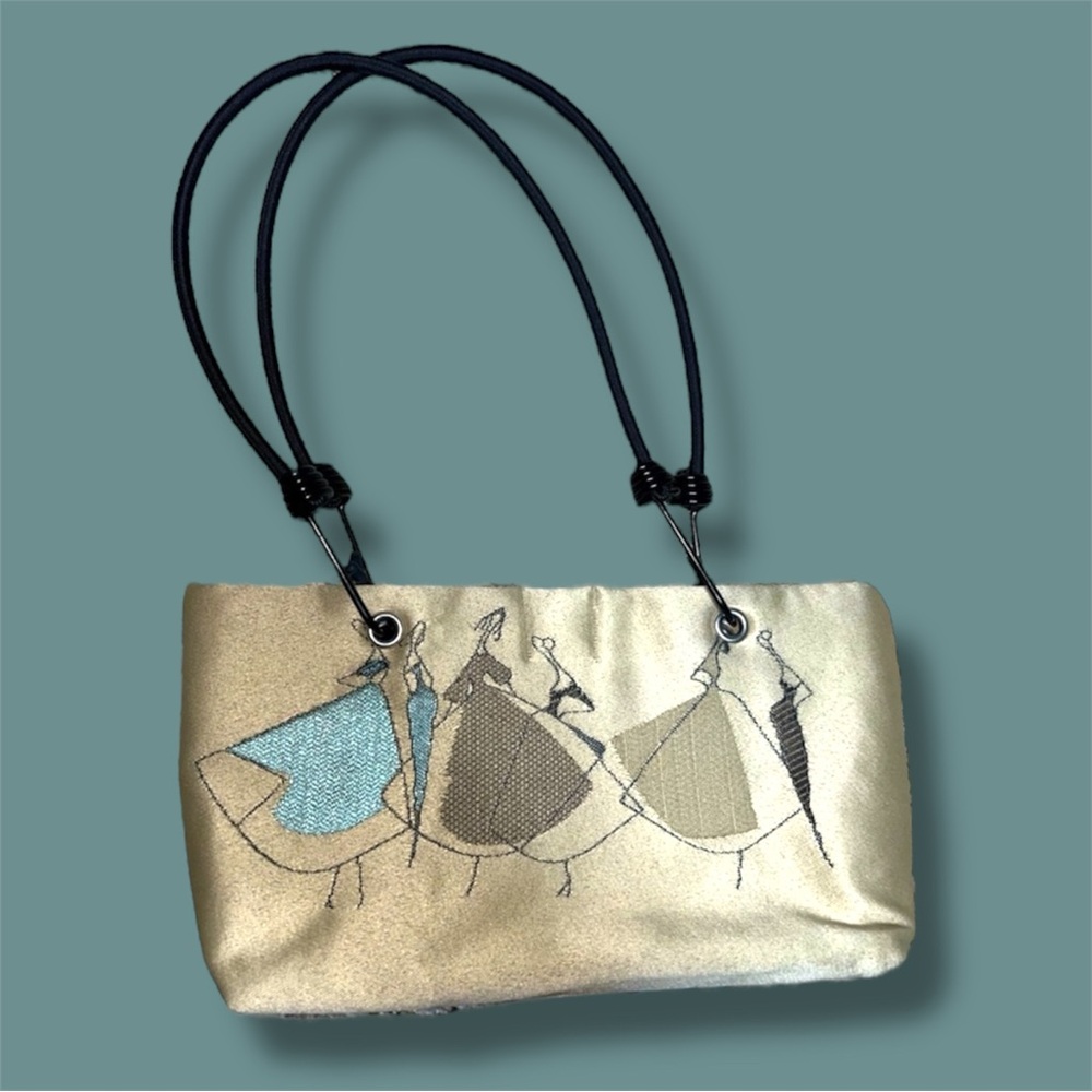 Vintage unique bungee purse with stitched in ladies